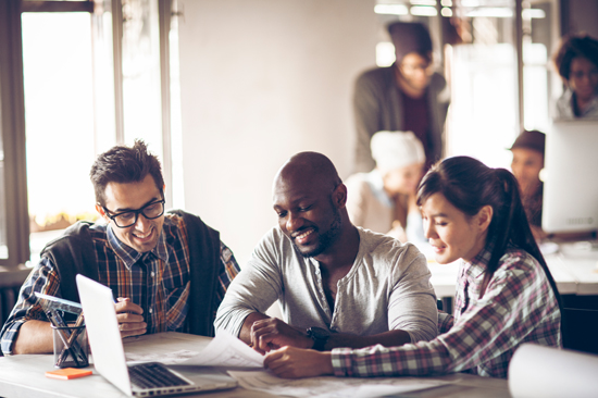 Picture of freelance designers working together in an office.